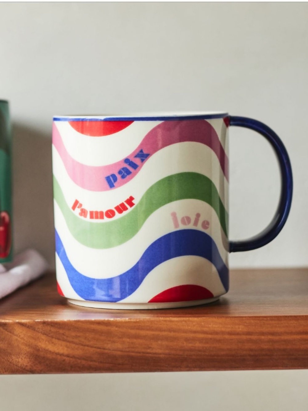 Anthropologie X Maeve Paris’s Paix Cream Mug with Multicolor Wavy Stripes